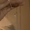 Nuevo collar pequeño con borla de llave para mujer, cadena dulce y linda para la clavícula, elegante y lujoso, de nicho y alta gama, disponible para envío directo