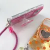 Corazón de lunares adecuado para funda de teléfono Apple 18promax iPhone17P soporte 16 con espejo 15P bolso