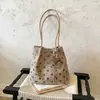 Bolsa Feminina Outono Inverno Estilo Coreano Bolsa de Bolinhas Grande Capacidade Tendência Versátil Moda 2026 Nova Ombro Único Saco de Balde para o Trabalho