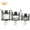 En stock al por mayor cuchara base de crema botella de vidrio tapa electrochapada protector solar crema para dama cosméticos set de botellas sub-empaque