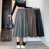 Nueva colección otoño/invierno 2026: falda versátil y elegante de longitud media de piel sintética, falda larga para mujer, falda de línea A con cintura elástica