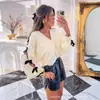 Otoño e Invierno 2025 Nuevo Cardigan de Color Sólido Botón Flor de Mariposa Suéter Casual para Mujer Transfronterizo Europeo y Americano Amazon Wish