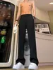 Pantalones negros de pierna recta con caída, pantalones casuales largos para hombre de primavera y otoño con un ligero ensanchamiento