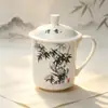 Taza de té de cerámica para habitación de hotel con tapa, vaso de agua para reuniones de oficina, taza con tapa de porcelana de hueso, taza de té con grabado