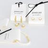 Fábrica Lote Pequeño Personalizado Tela para Pendientes de Algodón Tarjeta de Papel Tela Suave Tarjeta de Pendientes de Gama Alta Simple Tarjeta para Pendientes Collares Joyería