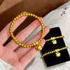 Mismo Estilo que el Pulsera de Cuentas Gatito con Lazo Dorado Arena de la Tienda Dorada Puzuo para Mujer, Pulsera Linda de Dibujos Animados Hecha a Mano