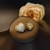 Pendientes de cristal y perla con incrustaciones de circonita y flor de amor de cobre, sentido de lujo ligero de alta gama, joyería de moda para mujer, temperamento de viajera, venta al por mayor