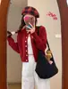 Suéter de punto de cuello redondo azul claro chaqueta cárdigan outfit estilo coreano para principios de otoño ajuste ceñido favorecedor manga larga top corto