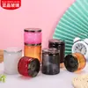 Suporte de vela redondo esculpido para atacado Recipiente de vela decorativo romântico DIY Copo de vela de aromaterapia de vidro colorido com tampa