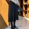 Saia midi de lã cinza super bonita feminina outono 2026 inverno nova cintura alta linha A barra larga saia de lã acetato