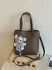 Bolso de Alta Gama con Textura de Gran Capacidad para Mujer 2025 Nuevo Bolso Cruzado Versátil Casual Bolso Cubo de Nicho para Viajes y Uso Diario