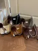 Bolso cruzado de diseño nicho de moda casual transfronterizo, estilo japonés y coreano, bolso de axila tipo "bollo" para mujer, bolso de hombro cruzado estilo coreano para commuting