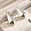 Brincos de Tarraxa Triângulo Vazado Tridimensional Estilo Minimalista Transfronteiriços Europeus e Americanos Design Único Personalidade Temperamento Acessórios para Orelhas