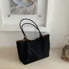 Bolsa de gran capacidad para el día a día para mujer, nuevo modelo de verano 2026, bolso de hombro vintage de nicho de alta gama, bolso tote versátil