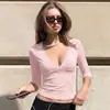 Ropa de mujer transfronteriza 2026 otoño nueva moda color liso manga tres cuartos cuello en V sexy ribete de encaje ajuste ceñido camiseta top