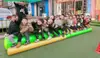 Nuevo equipo de entrenamiento de integración sensorial de tambor de aceite inflable, fabricante de accesorios para reuniones deportivas al aire libre