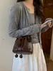 Bolsa de saco com cordão super popular estilo coreano transfronteiriça para mulheres, novo modelo 2026, tendência este ano, bolsa de ombro e transversal requintada, estilo bolsa da sorte