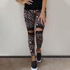 Leggings con estampado de leopardo de moda europea y americana para mujer, nuevos pantalones casuales ajustados de seda de leche rasgados de cintura alta de primavera y otoño para mujer