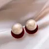 Pendientes Rojos de Nuevo Modelo 2026 para Año Nuevo para Mujer, Pendientes de Perla con Lazo de Terciopelo Rojo, Pendientes de Lujo Ligero de Nicho de Gama Alta