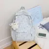 Mochila de novo estilo para estudantes do ensino fundamental II e médio, versão coreana estampada casual, estilo niche ins, bolsa para laptop de estudante com tema de floresta