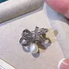 Accesorios DIY Moda Elegante Lazo Broche de Perla Exquisita Hebilla de Ojal para Traje Cardigan Antideslizante Pin Pequeño