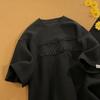 Camiseta de manga corta con diseño de gofres para hombre, estilo americano de verano, de calle alta, de manga corta, de peso pesado, de marca moderna, holgada, transpirable, de color sólido y cuello redondo.