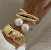 Europa y Estados Unidos joyería transfronteriza pulsera de aleación plisada irregular ins gota de agua cruz perla traje de pulsera