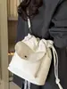 Bolso Casual Pequeño Simple 2026 Nuevo Estilo Bolso Cubo de Lona con Cierre de Cordón de Alto Valor Color Puro Elegante Bolso Cruzado