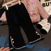Calças de Veludo Cor Lisa com Barra Larga Ningli Girls Estilo Novo Inverno 2025 Calças Retas Roupas Infantis Dropshipping