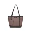 Elegante y versátil bolsa tote de gran capacidad para el otoño de 2026, perfecta para el trabajo y el uso diario, con un diseño chic y moderno