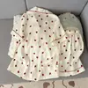 Fábrica al por mayor Pijama de algodón nube de manga corta de verano para mujer, Pantalones cortos cómodos y modernos que se pueden usar afuera, Conjunto de ropa para el hogar