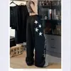 Pantalones deportivos casuales negros estilo americano para mujer, pantalones holgados de pierna ancha para verano y otoño con un diseño elegante, pantalones deportivos de danza jazz