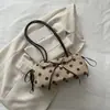 Bolso de mano de alta gama para mujer, nuevo y moderno 2026, bolso de hombro versátil para el día a día, bolso de axila de lujo ligero y elegante