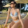 Traje de baño de cuatro piezas dividido de nuevo estilo 2026 para mujer, que oculta el abdomen y estiliza, adecuado para playa, vacaciones y aguas termales [Disponible para Dropshipping]