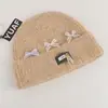Gorro de mezcla de lana para mujer de otoño e invierno, estilo coreano, versátil, moderno, corte holgado, hace que la cara se vea más pequeña, cálido, tejido