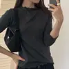 Ropa de mujer, estilo Dongdaemun coreano, top básico de color liso de alta calidad, dobladillo ondulado, corte ajustado, favorecedor, tejido suave, camiseta de manga larga