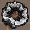¡Cuatro capas! Encaje pequeño floral anillo para el cabello de intestino grueso ~ retro francés de alta gama falda flor capullo bola cuerda para el cabello