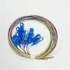 Paquete de 12 fibras pigtail LC monomodo cable de parcheo de fibra óptica pigtail de 12 colores FC/SC cabeza cuadrada grado telecomunicaciones