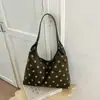 Transfronterizo Otoño 2026 Nuevo Diseño de Nicho Casual Bolso de Hombro de Lunares Moda Versátil Vintage Bolso de Axila