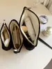 Bolsa de Maquillaje Nueva de Nicho de Gran Capacidad con Interior Floral Tejido, Bolso Conveniente para Uso Diario, Bolso de Mano para Mujer, Estilo Ins