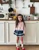 Nueva Colección Primavera y Otoño 2026: Conjunto Dulce y Ligero de Dos Piezas para Niñas, con un Cárdigan de Tirantes y un Atuendo Lindo para Salir