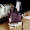 Bolso retro tipo concha de estilo coreano para mujer, nueva colección 2026, bolso tote casual con temática de bolos, bolso de hombro y bolso cruzado versátil