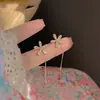 Pendientes largos de borla con flor de cristal, modernos y únicos, con un toque de alta gama, cadena para la oreja elegante, versátiles y a la moda para mujer.