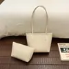 Elegante bolso tejido de patrón vintage para mujer, nuevo bolso tote de verano 2026 de nicho para el trabajo, bolso de hombro de gran capacidad