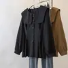 Ropa de mujer talla grande 2026 otoño nueva moda casual abotonada de manga larga suelta entallada a la cintura top camisa