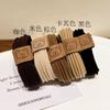 Cuerda para el pelo con forma de cabeza de oso, de goma elástica, para mujer, estilo nuevo, con forma de anillo, duradera, con forma de bola y cubierta de cuero.