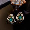 Brincos de zircônia assimétricos com design retrô de nicho de agulha de prata, brincos leves de luxo e de alta qualidade, brincos elegantes por atacado