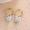 Pendientes de cerámica azul y blanco con cuentas pintadas a mano de estilo retro transfronterizo, diseño de nicho para mujer, aro de acero inoxidable, clip para oreja sin perforación