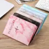 Portapasaporte de cuero con logo fijo transfronterizo, funda protectora de cuero para pasaporte, bolsa de viaje multifuncional de PU para identificación, borde aceitado