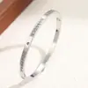 Pulsera de acero inoxidable estilo vintage ins transfronteriza, chapada en oro de 18 quilates, incrustada con circonita, joya de pulsera de acero de titanio con diamantes completos